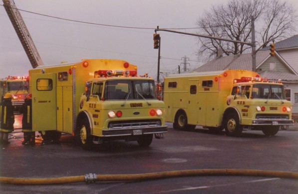 Squads 2 and 4 side-by-side atextra-alarm fire on College Ave., 1989