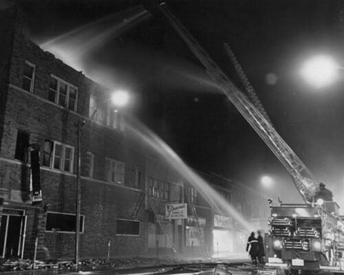 Ladder No. 1A in action at an extra-alarm fire on Wyandotte St. E. in May, 1968