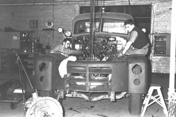 Under repair in WFD shops: Mechanics Dave Wedow and Mike Koehl