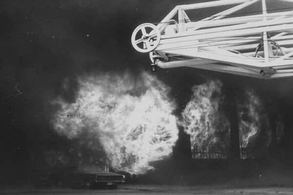 Flames boil from windows of Herald Press