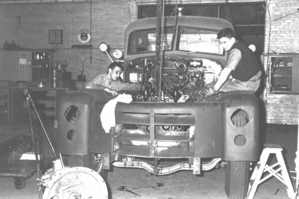 WFD Mechanics Dave Wedon and Mike Koehl rebuild Engine 5, 1964